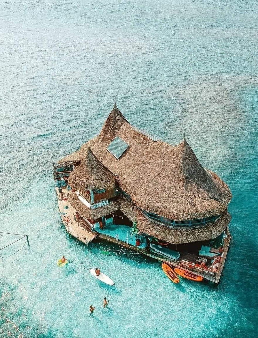 Island Hut and swimmers image